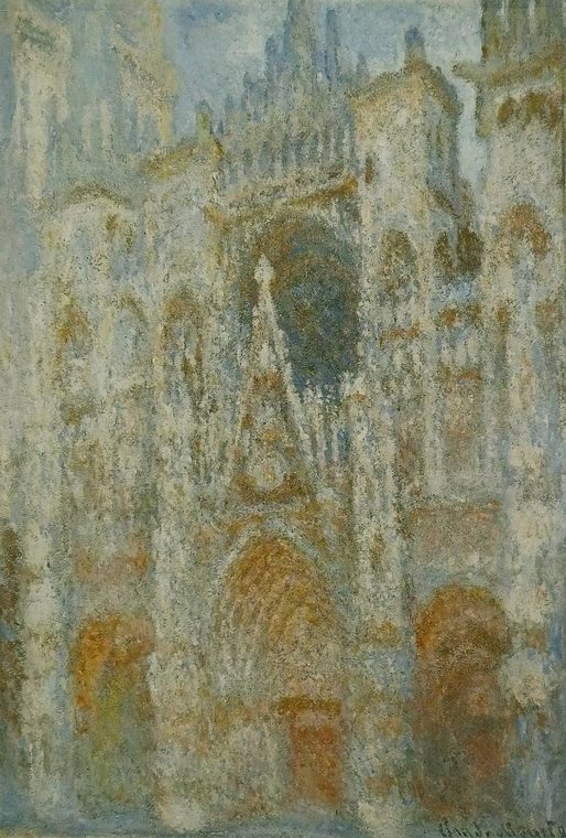 The façade of Rouen Cathedral in pale blue morning light