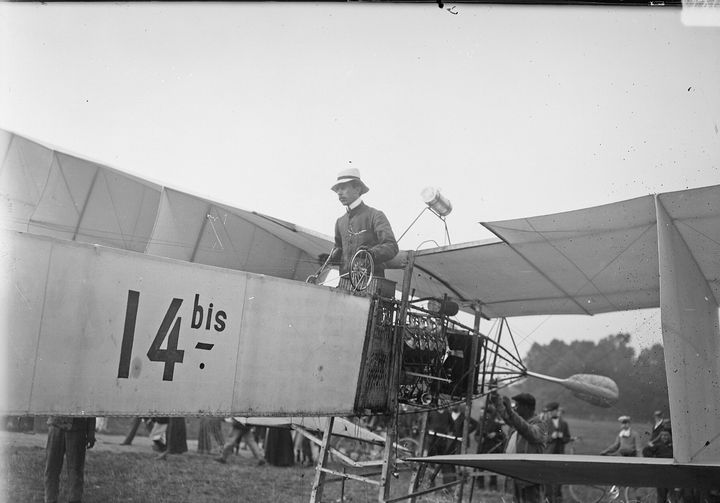 Alberto Santos-Dumont standing at the controls of his 14-bis at Neuilly in 1906